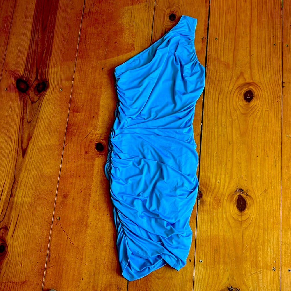 Blue one-shoulder formal dress.